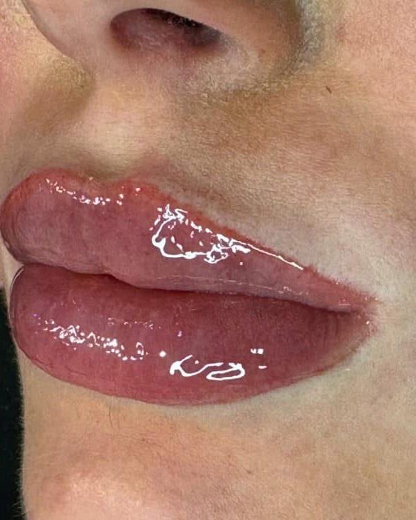 Healed lip blush permanent makeup, soft rose and even.